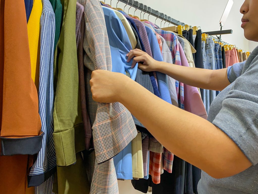 A professional and reliable apparel sourcing agent in Bangladesh inspecting garment quality.