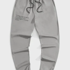 Contemporary joggers with subtle typography print and a relaxed fit design. Lightweight, comfortable, and ideal for everyday casual wear.